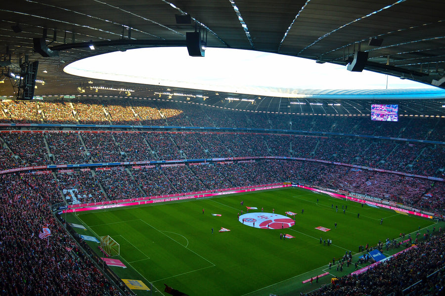 Diagonal view from a corner of the Allianz Arena during a game, full stadium